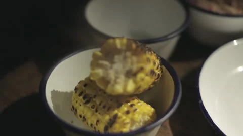 Steaming BBQ Corn Cobs Served in a Tin Bowl Stock Footage 68978230