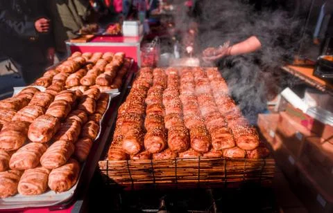 Steaming bread and bacon sprinkle with white sesame seeds. 스톡 사진