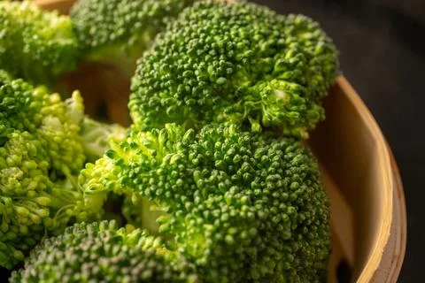 Steaming broccoli with bamboo steamer Stock Photos