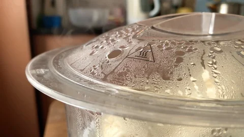 Steaming. Close-up of a double boiler on the background of the kitchen. Healthy  Stock Footage 118206944