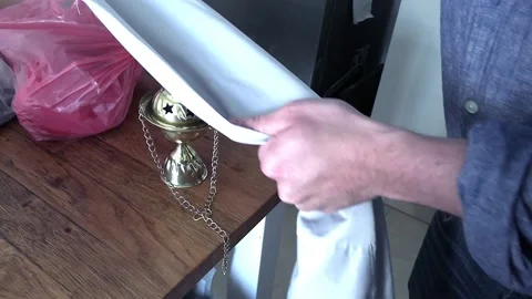 Steaming clothes with incense smoke Video stock 235317206