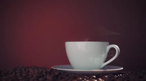 Steaming coffee with beans Stock Footage 56096602
