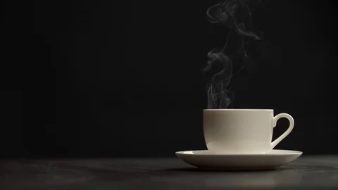 Steaming coffee cup on black background 스톡 동영상 99635076