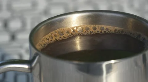Steaming coffee in a cup Stock Footage 66438444