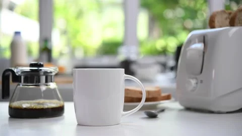 Steaming coffee cup in the kitchen Stock Footage 154615345