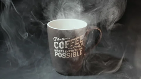 Steaming Coffee Mug Wrapped in Billowing Smoke Clouds Vidéo 337119895