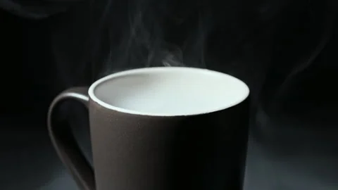 Steaming Coffee Mug Wrapped in Billowing Smoke Clouds Stock Footage 341960111