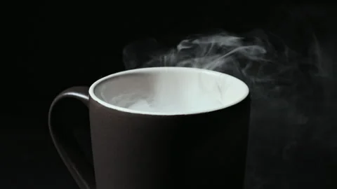 Steaming Coffee Mug Wrapped in Billowing Smoke Clouds Stock Footage 341960152