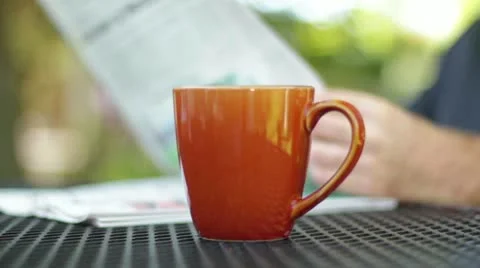 Steaming Coffee &amp; Newspaper Stock-Footage 12289056