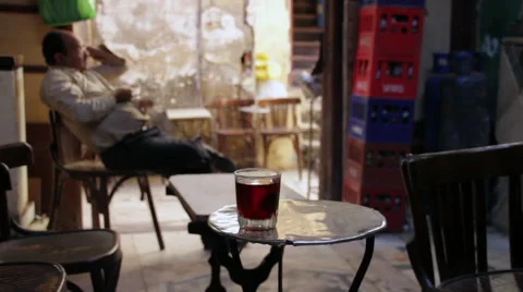 Steaming coffee on small table Stock Footage 49832942