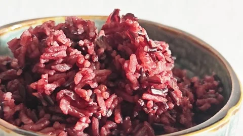 Steaming Cooked Riceberry Rice in a Ceramic Bowl. Stock Footage 340077035