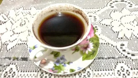 A Steaming Cup of Black Coffee Stock Photos