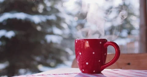Steaming Cup of Hot Drink in Snowy Winter Morning. 4K DCi SLOW MOTION 120 fps. Stock Footage 67217506