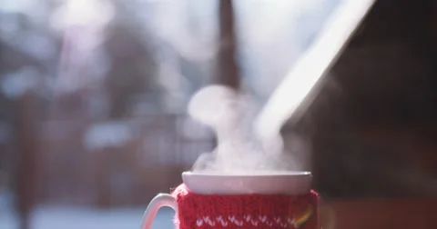 Steaming Cup of Hot Drink in Snowy Winter Morning. 4K DCi SLOW MOTION 120 fps. Video stock 67217600