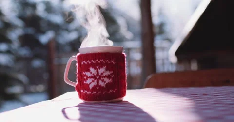 Steaming Cup of Hot Drink in Snowy Winter Morning. 4K DCi SLOW MOTION 120 fps. Stock Footage 67217635