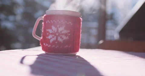 Steaming Cup of Hot Drink in Snowy Winter Morning. 4K DCi SLOW MOTION 120 fps. Stock Footage 67218051