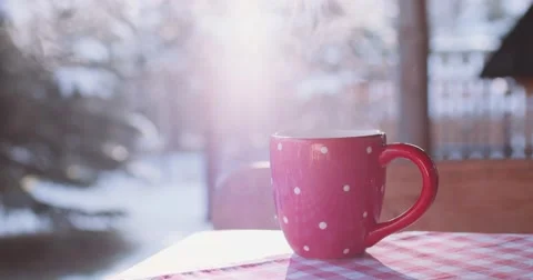 Steaming Cup of Hot Drink in Snowy Winter Morning. 4K DCi SLOW MOTION 120 fps. Stock Footage 67218063