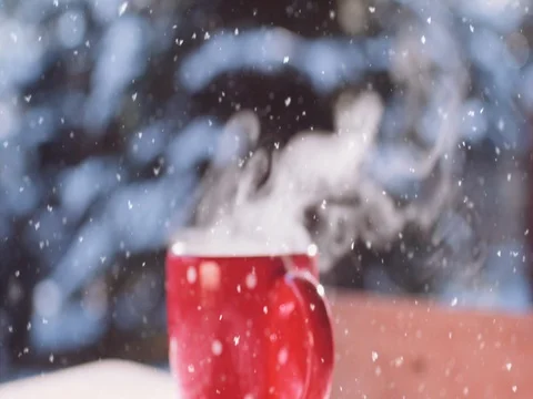 Steaming Cup of Hot Drink in Snowy Winter Morning. 4K DCi SLOW MOTION 120 fps. Stock Footage 70568871