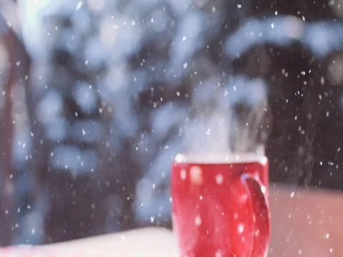 Steaming Cup of Hot Drink in Snowy Winter Morning. 4K DCi SLOW MOTION 120 fps. Stock Footage 70569098