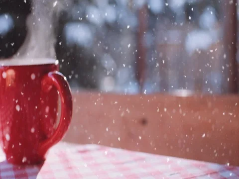 Steaming Cup of Hot Drink in Snowy Winter Morning. 4K DCi SLOW MOTION 120 fps. 動画素材 70569575