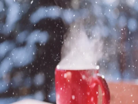 Steaming Cup of Hot Drink in Snowy Winter Morning. 4K DCi SLOW MOTION 120 fps. Stock Footage 70569618