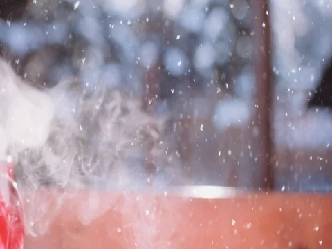 Steaming Cup of Hot Drink in Snowy Winter Morning. 4K DCi SLOW MOTION 120 fps. 스톡 동영상 70569780