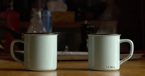 Steaming Cups of Coffee Inside of Cottage 库存影片 142655408
