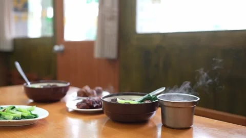 Steaming dishes on restaurant table Stock Footage 346302950