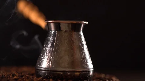 Steaming engraved silver coffee pot Stock-Footage 94462195