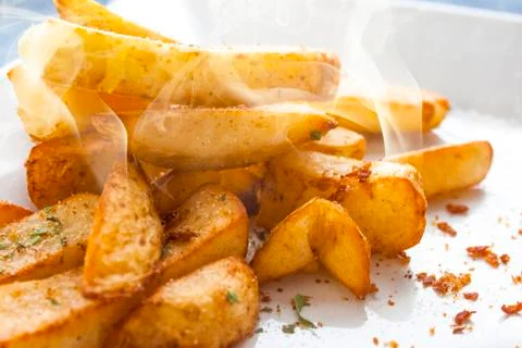 Steaming Freshly cooked Chips Stock Photos