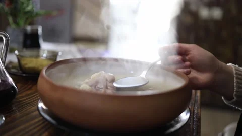 Steaming Georgian khash soup Stock Footage 331704258