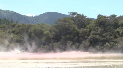 Steaming geothermal lake Stock Footage 4904343