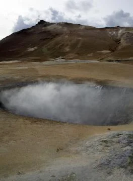 Steaming hole in the ground Stock Photos