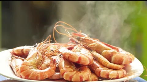 Steaming Hot Boiled Black Tiger Shrimps On Plate Close Up 4K Stock Footage 322148943
