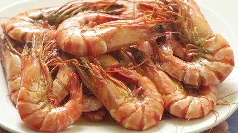 Steaming Hot Boiled Black Tiger Shrimps On Plate Close Up 4K Stock Footage 322149079