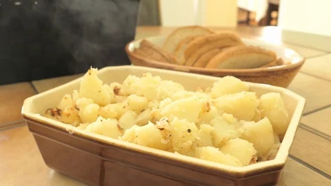 Steaming, hot boiled potatoes in a dish Stock Footage 89789464