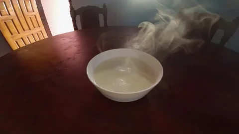 Steaming Hot Bowl on Table Stock Footage 313149346