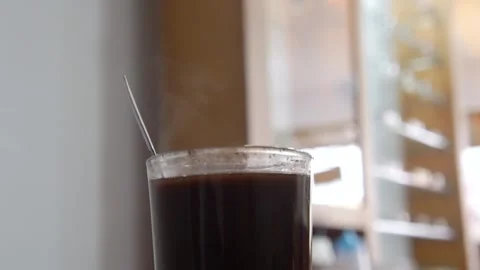 Steaming Hot Coffee in Glass Cup Close Up Stock Footage 202571007