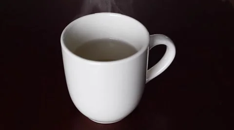 Steaming hot mug Stock Footage 62945888