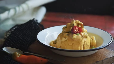 Steaming Hot Peruvian Seafood Causa with Creamy Huancaina Sauce Stock Footage 341438065