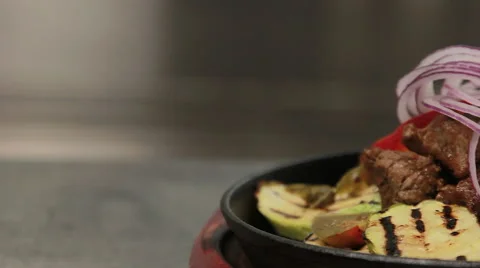 Steaming meat dish, close up, sliding 動画素材 66049514