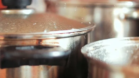 Steaming metal pot in the kitchen Video stock 117191942