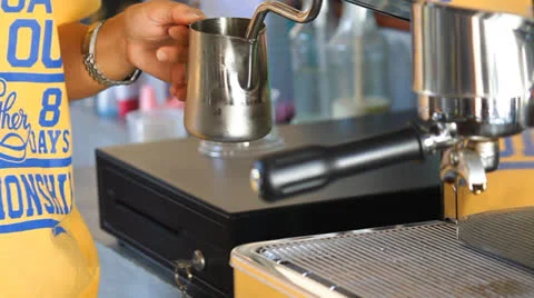 Steaming milk and clean steam wand Stock Footage 24874652