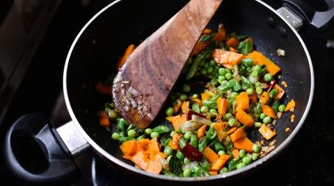 Steaming mixed vegetables in a pan Stock Photos