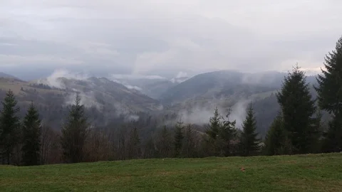 Steaming mountains. Horizontal panning. Stock Footage 76588059