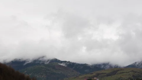 Steaming mountains. Steam comes from the slopes of the mountains after the rain. Stock Footage 75907550