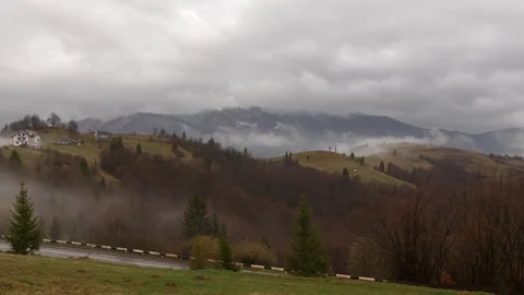 Steaming mountains. Steam comes from the slopes of the mountains after the rain. Stock Footage 76445060