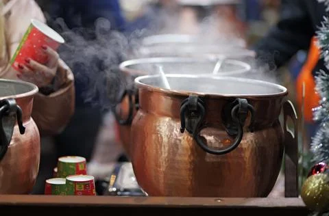 Steaming Mulled Wine Served from Copper Pots at Christmas Market Bulgaria, 2025 Stock Photos