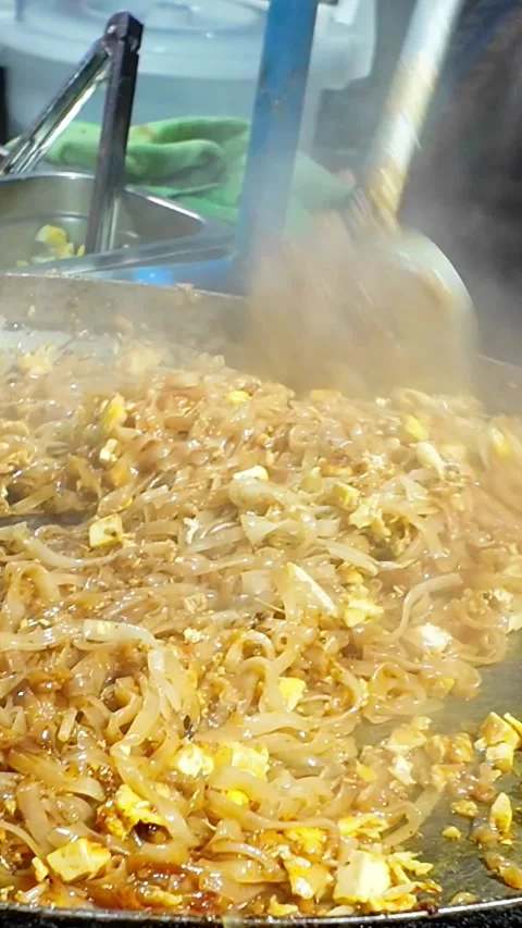 Steaming Pad Thai Noodles Close Up at Night Market Stock Footage 324804202