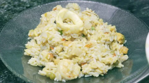 Steaming Paella on a Plate Stock Footage 139248996